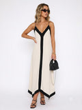 Robe longue bicolore noire et blanche portée en terrasse par Avenue des Dames
