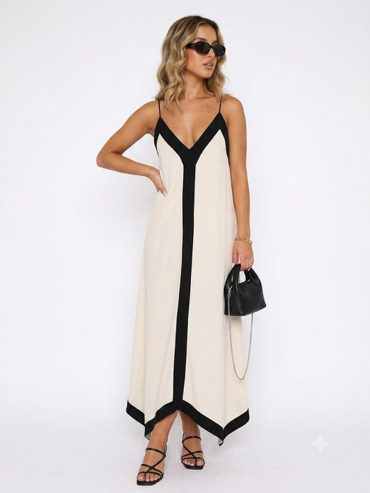 Robe longue bicolore noire et blanche portée en terrasse par Avenue des Dames